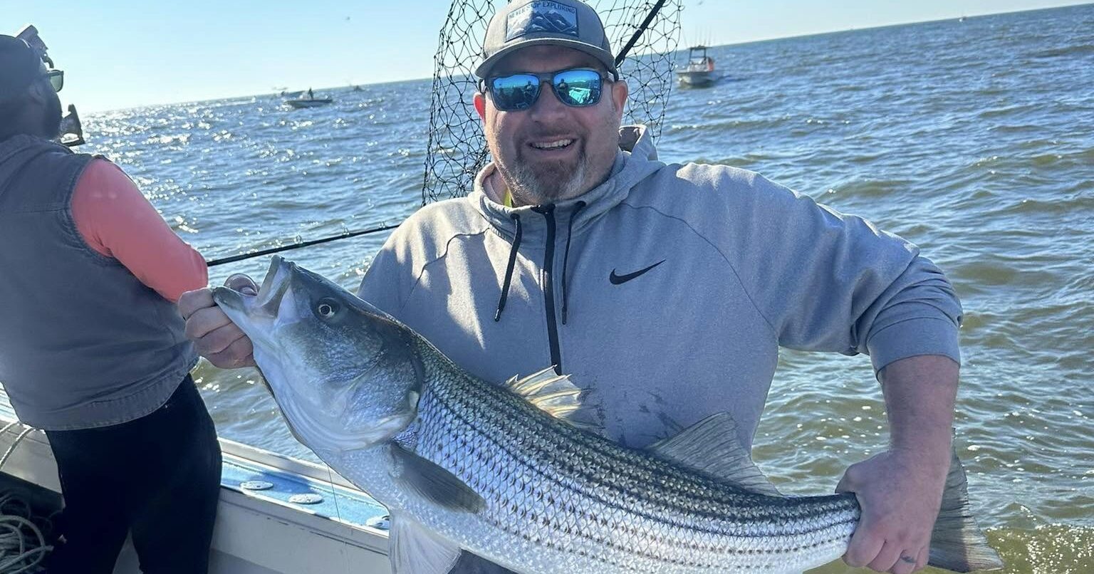 You are currently viewing Reel in the Action: Striped Bass Charters with the Sorry Charlie
